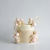 Picture of Beige Buttercream Cake with Spheres & Preserved Florals